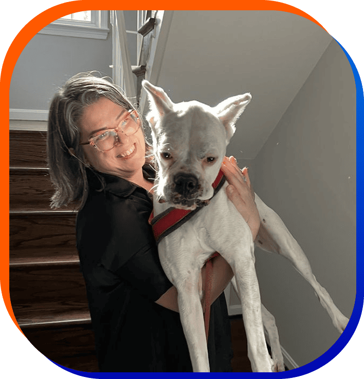 woman carrying the dog